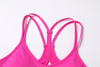 A BRA FOR YOGA AND STUDIO CLASSES, MADE IN PART WITH RECYCLED MATERIALS.