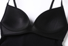 A BRA FOR YOGA AND STUDIO CLASSES, MADE IN PART WITH RECYCLED MATERIALS.